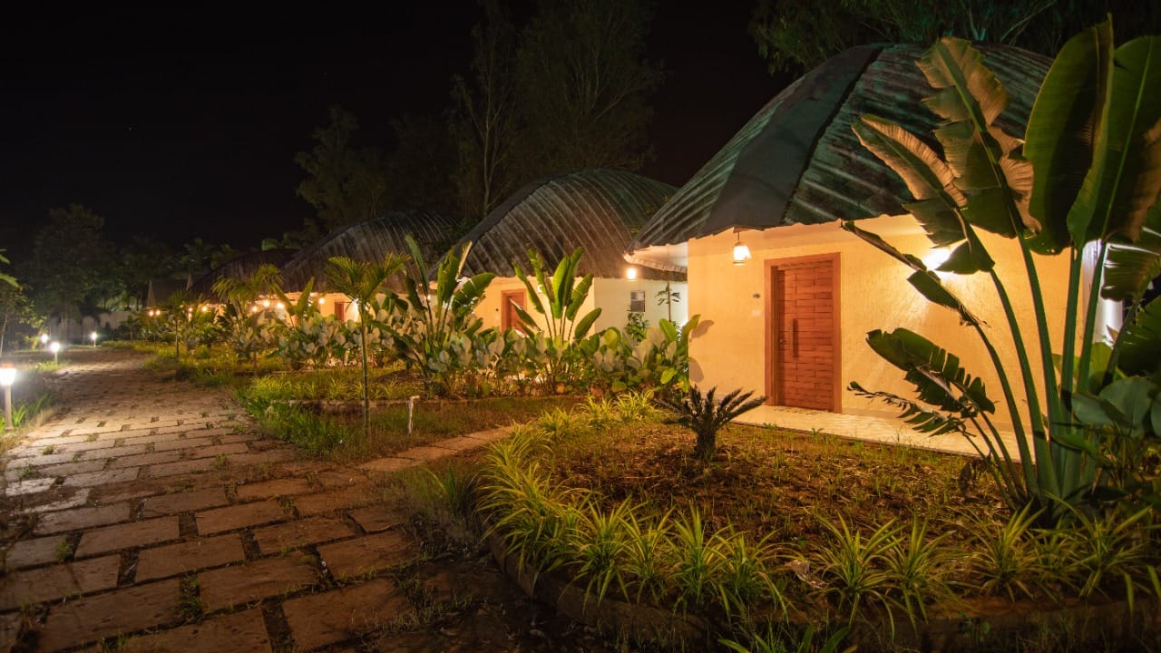 Eco-friendly riverside cottage with private sit-out